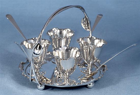 A Victorian silver egg cruet set with four egg cups,